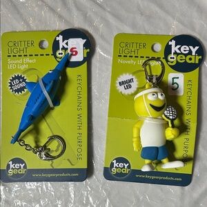 Set of 2 Key Gear Tennis Champ & Blue Dolphin LED Keychain